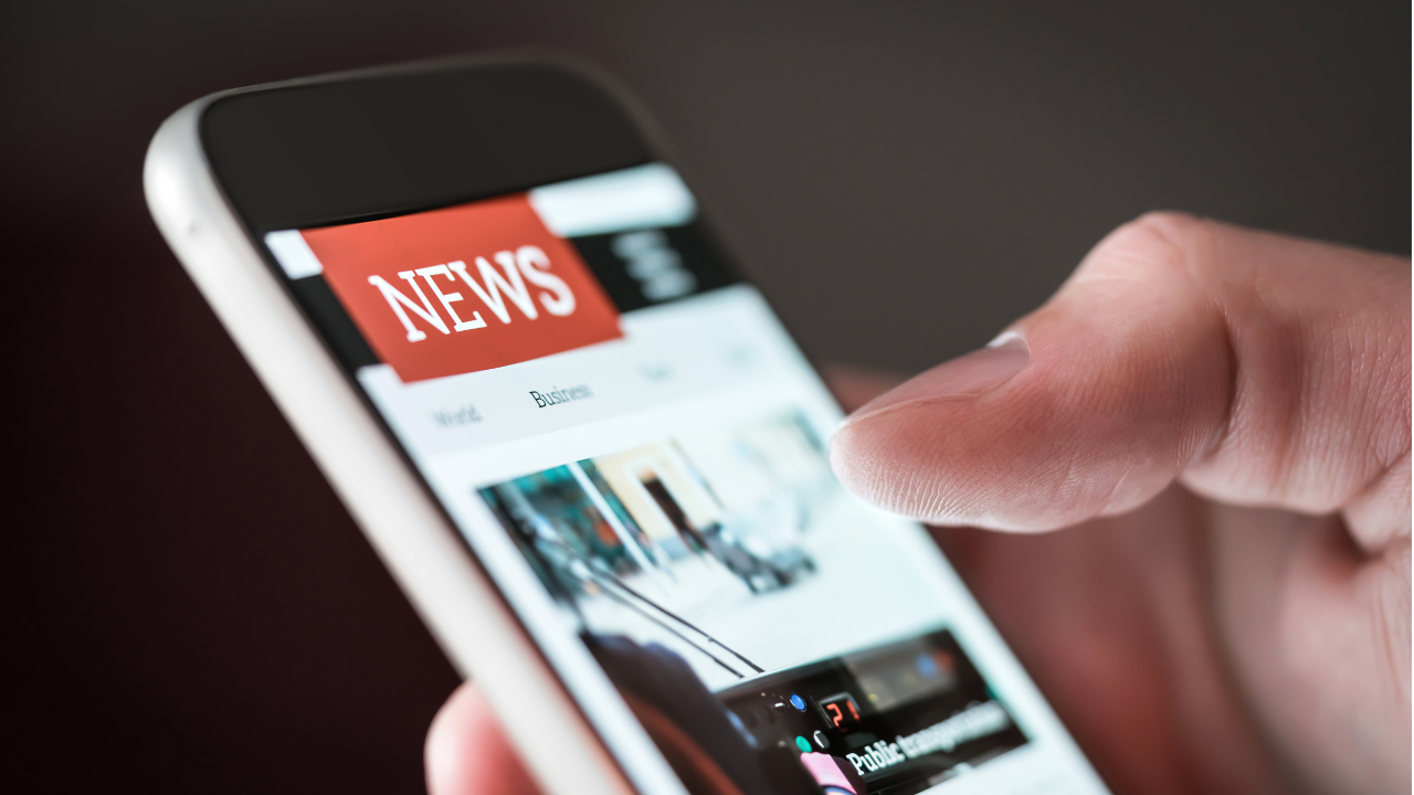 Person holding phone in hand